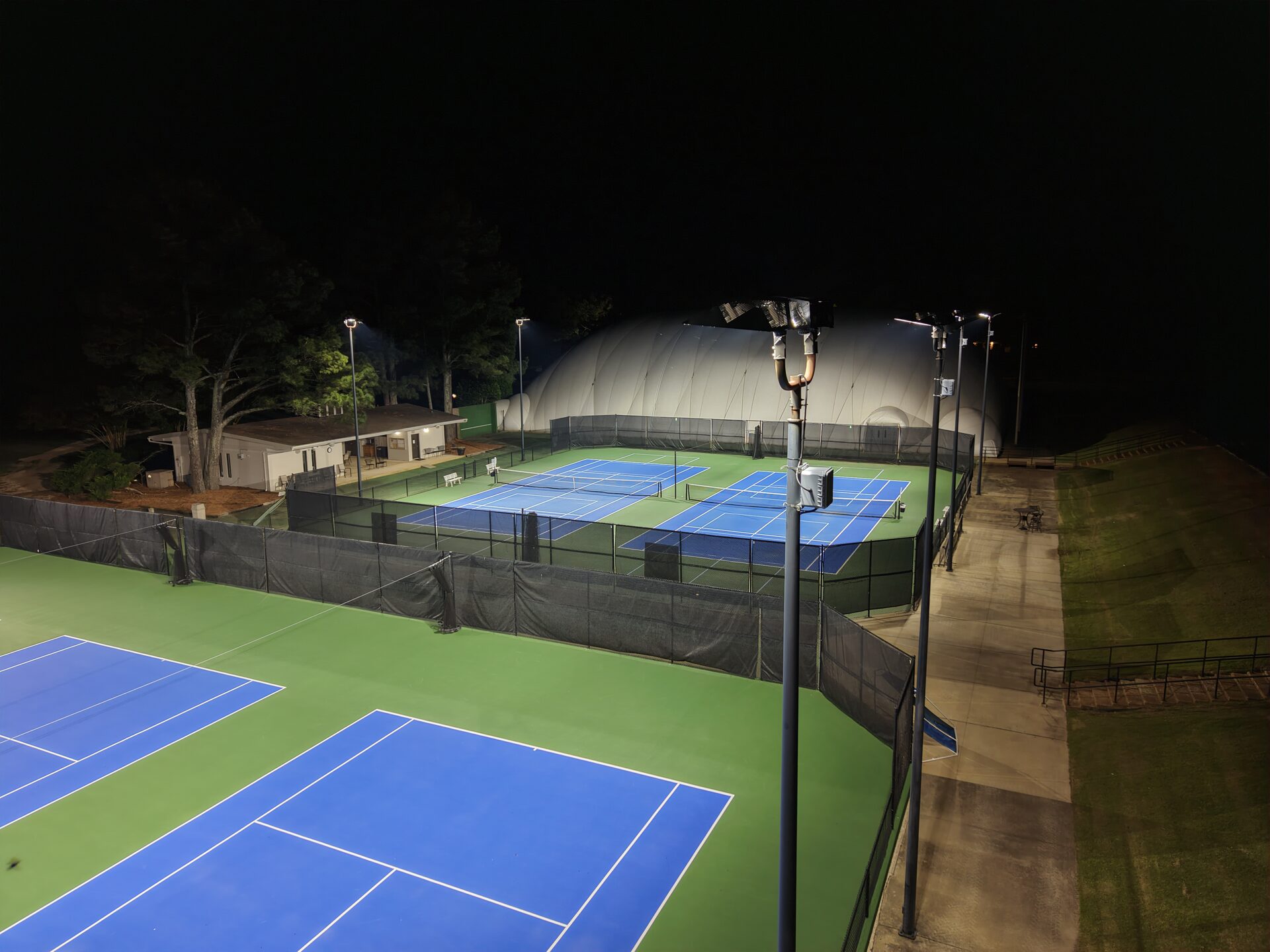 Close-up of sport-grade LED fixtures mounted on pole at Windyke Country Club