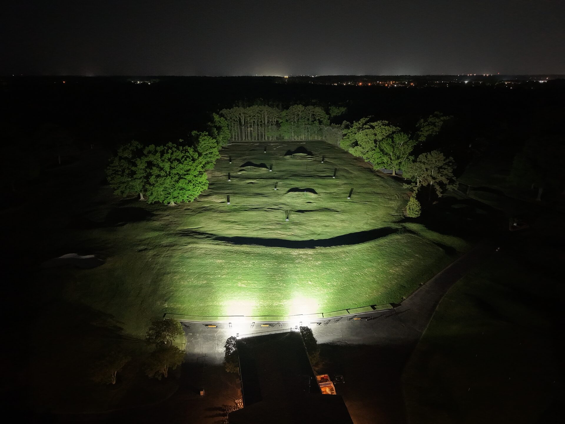 Aerial view of Windyke Country Club driving range and practice greens at night